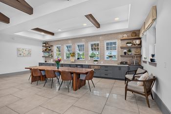 Craft room with ample work space and sink access